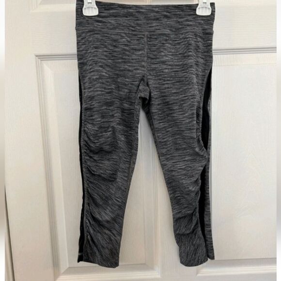 lululemon athletica Pants - Lululemon cropped legging sheer side panel zippered pocket in back size 4